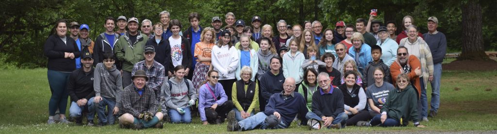 A group of about sixty volunteers at Camp Lutherwood Oregon