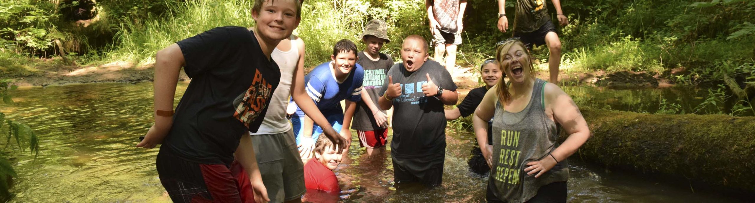 Campers in Luther Creek at Camp Lutherwood Oregon